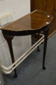 A demi lune side table.