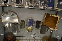 Plated tray, a bread board with plated frame and other items.