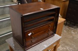 Table top cabinet, lacking three drawers.