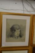 A charcoal portrait of a young lady.