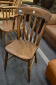 A beech and elm kitchen chair.