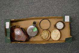 A pocket barometer and other items.