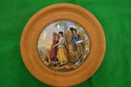 A porcelain pot lid, The Irishman, framed (rare).