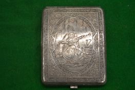An Indian white metal cigarette case with engraved decoration.
