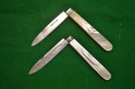 Two silver and mother-of-pearl folding fruit knives.