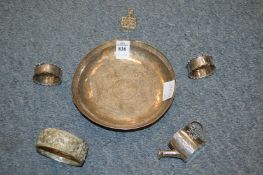 A Chinese white metal miniature watering can, a filigree bracelet, silver napkin rings etc.