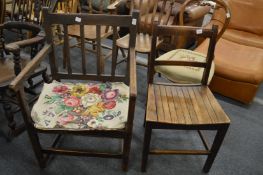 A rustic country made oak armchair and a similar single chair.