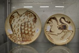A circular studio pottery plate painted with an owl, possible by Michael Cardew, Kingwood Pottery,