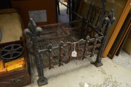 A cast iron fire grate.