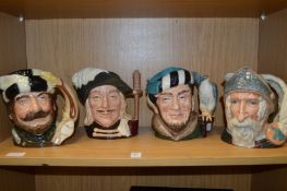 Three large Royal Doulton toby jugs, Aramis, Trapper, The Falconer and Don Quixote.