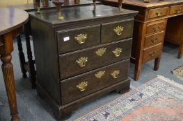 A small oak chest of drawers.