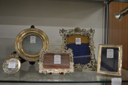 Five various silver photograph frames.