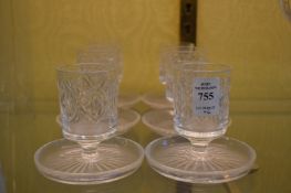 A set of six cut glass candle stands (?).