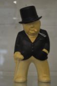 A Bovey Pottery Devon 'Our Gang' painted pottery model of Winston Churchill.
