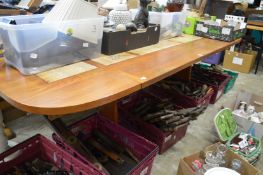 A Danish teak and tile inset extending dining table.