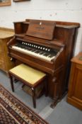 A Victorian walnut cased organ manufactured by The Gable Company, Chicago, USA.
