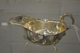 A silver sauce boat.