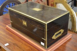 A very good 19th century brass bound ebony writing slope or lap desk, sold by T Forgie, 93
