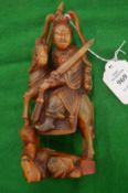 A good carved horn figure of a Chinese warrior on horse back.