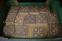 A large quantity of The Campbell Tile Company encaustic floor tiles, various designs.