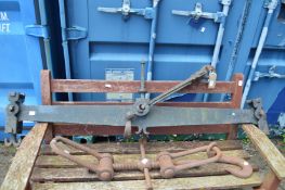 A large cast and wrought iron beam scale.