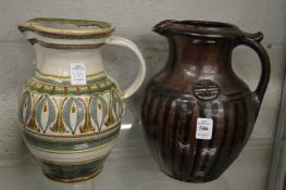Mick and Leslie Dixon, Bartley Heath Pottery, a large dark glazed pottery jug together with
