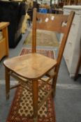 A set of ten beech and elm Chapel chairs.