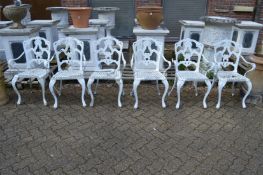 A set of six white painted aluminium garden armchairs (faults).