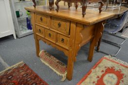A Chinese soft wood altar table/chest of drawers.