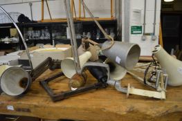 Various wall mounted angle poise lamps.