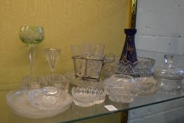 Cut glass bowl and other glassware.