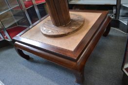 A Chinese square low coffee table.