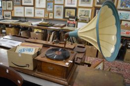 A Selecta gramophone with large painted horn and small collection of records.