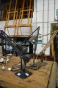 Three old angle poise lamps.