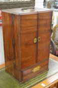 George III mahogany apothecary cabinet, the two doors opening to reveal a fitted interior (