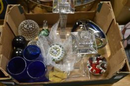 Glass paperweights and other items.