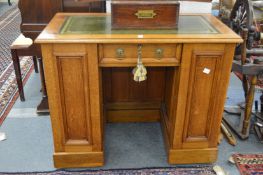A good small oak pedestal desk.