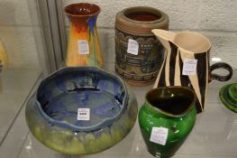 A small Watcombe green glazed vase and four other items.