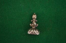 A gilt metal fob seal, the matrix engraved with a lion rampant on a crown.