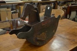 A folk art painted rocking horse.