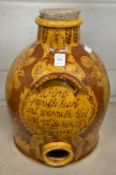 A Mary Wondrausch, Wharf Pottery, Godalming, a good large wine flagon with incised script and