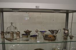 Various plated items to include novelty champagne cork pepperettes, toast rack, table lighter,