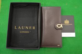 A Launer, London ladies brown leather purse with original box.