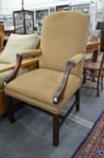 A Georgian style mahogany framed library armchair.
