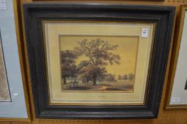 Trees in a landscape, in a hand painted frame.