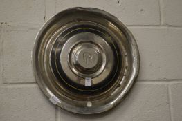 A Rolls Royce hub cap.