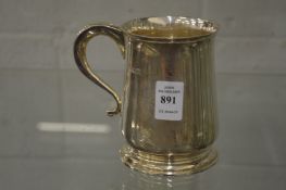 A silver tankard.