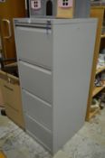 Metal four drawer filing cabinet.