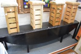 An ebonised wake table.