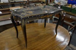 A Chinese chinoiserie decorated lacquer coffee table, the top with geese and foliage.